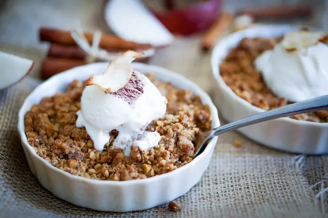 This apple crisp recipe uses very simple ingredient including fresh cut apples, brown sugar, flour, oats, cinnamon and nutmeg.