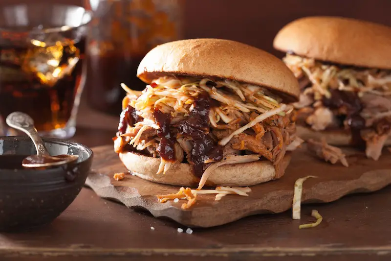 Serve this barbecue pulled pork recipe on a toasted bun with a helping of your favorite barbecue sauce. Did I mention this is a easy crock pot pulled pork recipe?