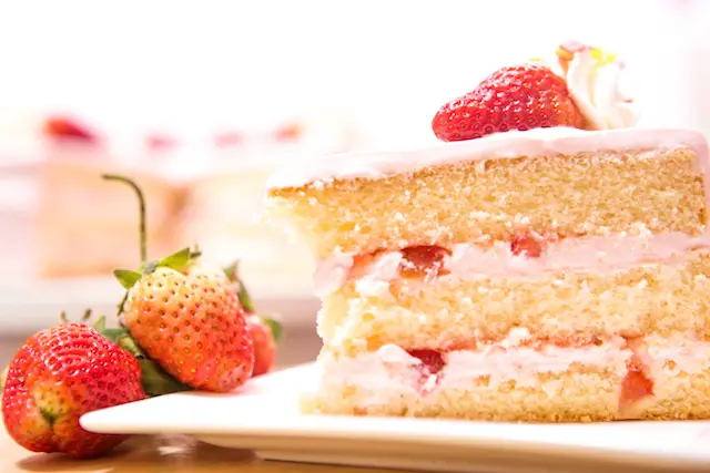 Try this non-traditional strawberry shortcake recipe with sponge cake, strawberry topping, ice cream and whipped cream.